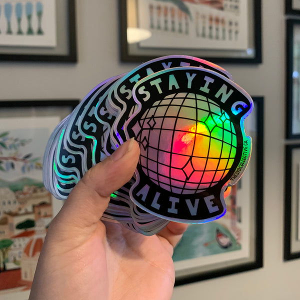 STAYING ALIVE HOLOGRAPHIC STICKER